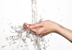 hands-under-water-coming-from-faucet